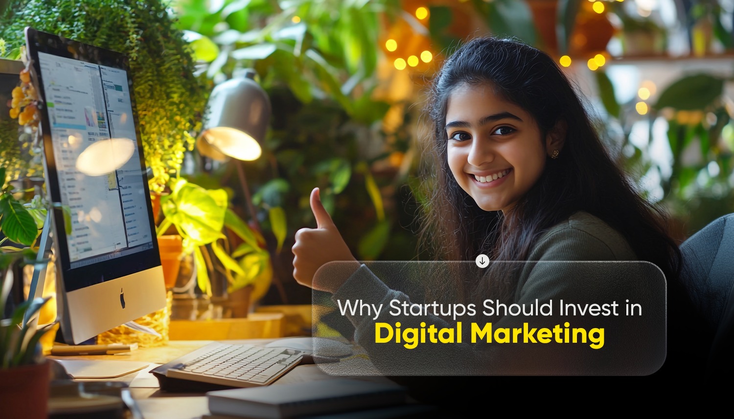 Startup founder using laptop and calculator, highlighting why Kochi startups should invest in digital marketing early